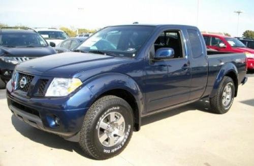 Photo of a 2010 Nissan Frontier in Navy Blue (paint color code RAB)