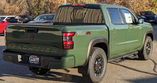 Photo of a 2022-2025 Nissan Frontier in Tactical Green Metallic (paint color code DAQ)