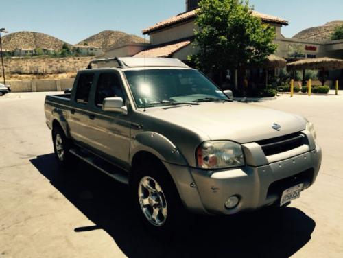 Photo of a 2000-2004 Nissan Frontier in Sand Dune (paint color code CV0)