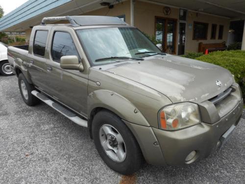 Photo of a 2001-2002 Nissan Frontier in Gold Rush (paint color code EX1)