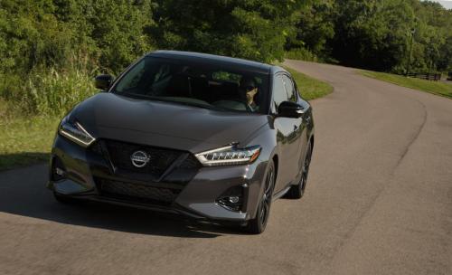 Photo of a 2021 Nissan Maxima in Super Black on Ruby Slate Gray Pearl (paint color code XGS)