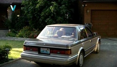 Photo of a 1987 Nissan Maxima in Dark Pewter on Light Pewter Metallic (paint color code 558)