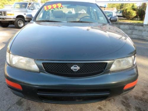 Photo of a 1995 Nissan Maxima in Black Emerald (paint color code DJ2)