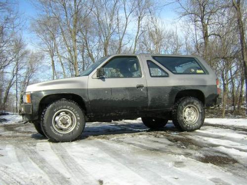 Photo of a 1987 Nissan Pathfinder in Medium Pewter Metallic on Thunder Black (paint color code 495)