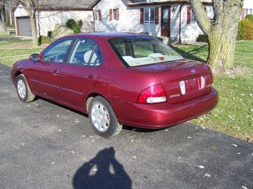 Photo of a 2003 Nissan Sentra in Inferno (paint color code AX2)