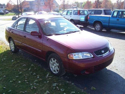 Photo of a 2006 Nissan Sentra in Inferno (paint color code AX2)