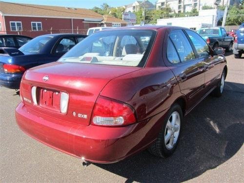 Photo of a 2003 Nissan Sentra in Inferno (paint color code AX2)