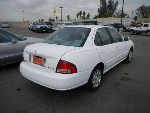 Photo of a 2001-2006 Nissan Sentra in Cloud White (paint color code QM1)