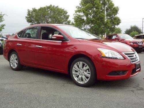 Photo of a 2013-2014 Nissan Sentra in Red Brick (paint color code NAC)
