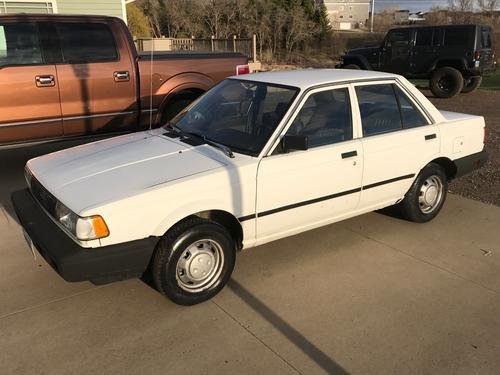 Photo of a 1993 Nissan Sentra in Vail White (paint color code 503