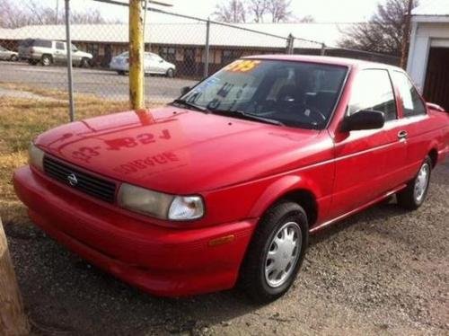 Photo of a 1991 Nissan Sentra in Aztec Red (paint color code AG2