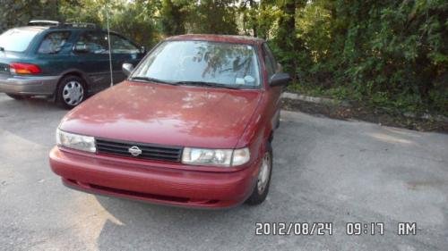 Photo of a 1991-1992 Nissan Sentra in Cherry Red Pearl (paint color code AH3