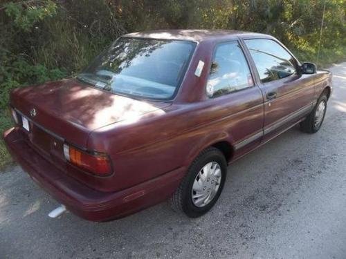 Photo of a 1993 Nissan Sentra in Ruby Pearl (paint color code AL0