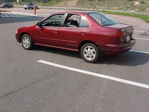 Photo of a 1997 Nissan Sentra in Ruby Pearl (paint color code AL0