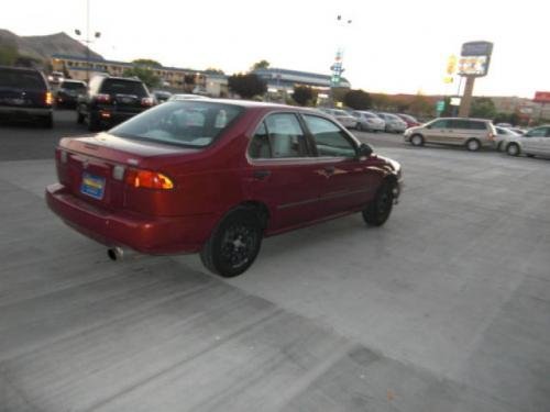 Photo of a 1998 Nissan Sentra in Cinnamon Bronze (paint color code AT1)