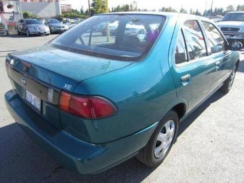 Photo of a 1995 Nissan Sentra in Vivid Teal (paint color code FN4)