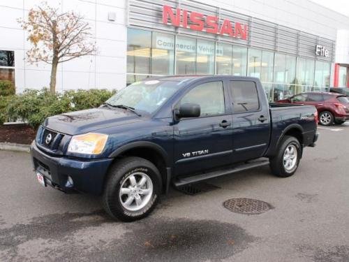 Photo of a 2011 Nissan Titan in Navy Blue (paint color code RAB)