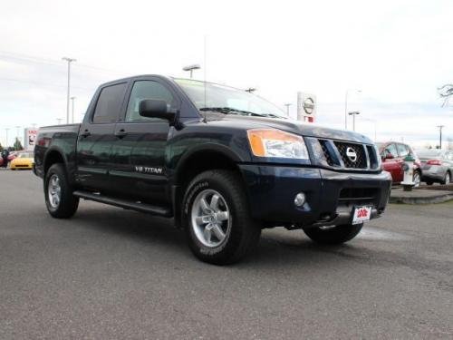 Photo of a 2011 Nissan Titan in Navy Blue (paint color code RAB)