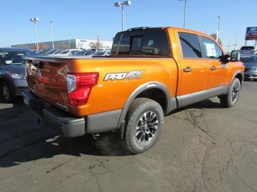 Photo of a 2019 Nissan Titan in Moab Sunset Metallic (paint color code EBB)