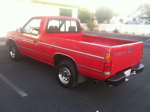 Photo of a 1986.5-1989 Nissan Truck in Bright Red (paint color code 465