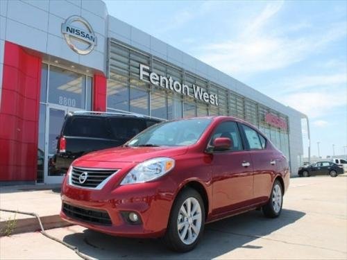 Photo of a 2014 Nissan Versa in Red Brick (paint color code NAC)