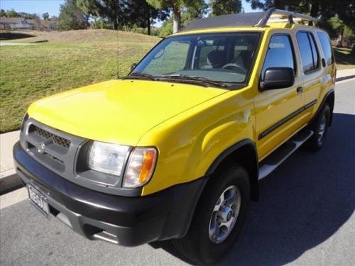 Photo of a 2000-2004 Nissan Xterra in Solar Yellow (paint color code EW3)