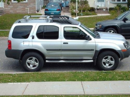 Photo of a 2004 Nissan Xterra in Silver Lightning (paint color code K12)