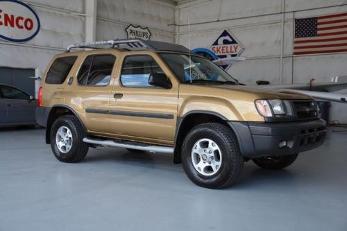 Photo of a 2000 Nissan Xterra in Trophy Bronze (paint color code YV2)