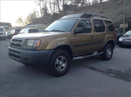 Photo of a 2000 Nissan Xterra in Trophy Bronze (paint color code YV2)