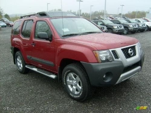 Photo of a 2010 Nissan Xterra in Red Brick (paint color code NAC)