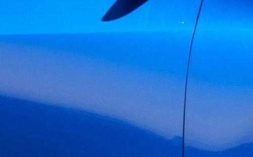 Photo of a 2024 Nissan Z in Seiran Blue TriCoat (paint color code XJR)