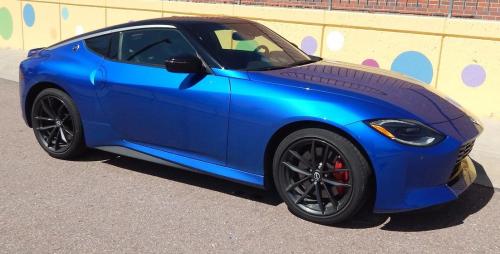 Photo of a 2023-2024 Nissan Z in Super Black on Seiran Blue TriCoat (paint color code XJR)