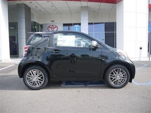 Photo of a 2012-2015 Scion iQ in Black Sand Pearl (paint color code 2KS)