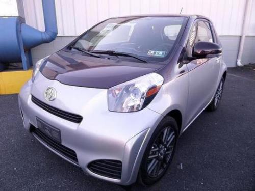 Photo of a 2014 Scion iQ in Black Currant Metallic on Classic Silver Metallic (paint color code 2LT)