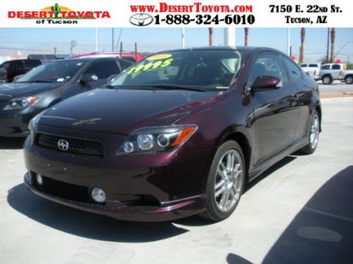 Photo of a 2010 Scion tC in Sizzling Crimson Mica (paint color code 3R0)