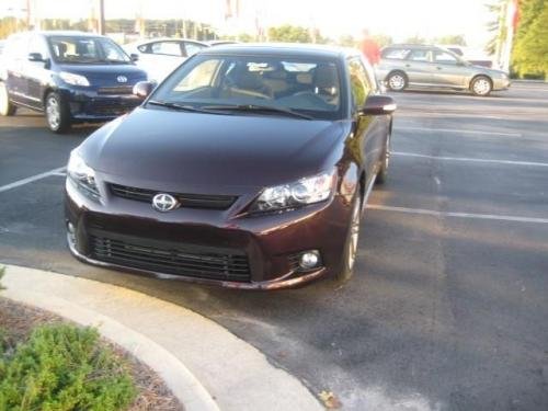 Photo of a 2011-2013 Scion tC in Sizzling Crimson Mica (paint color code 3R0)