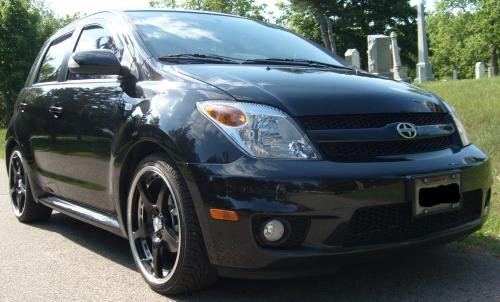Photo of a 2004-2006 Scion xA in Black Sand Pearl (paint color code 209)