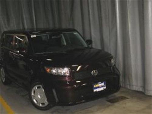 Photo of a 2010 Scion xB in Sizzling Crimson Mica (paint color code 3R0)