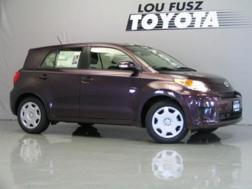 Photo of a 2010-2014 Scion xD in Black Currant Metallic (paint color code 9AH)