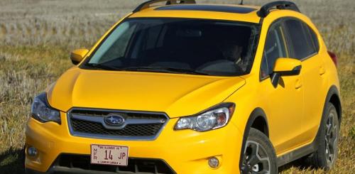 Photo of a 2015 Subaru Impreza in Sunrise Yellow (paint color code C2Z)
