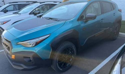 Photo of a 2027 Subaru Impreza in Tidepool Teal Pearl (paint color code 8L5)