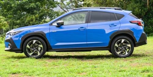 Photo of a 2024-2025 Subaru Impreza in Oasis Blue (paint color code XDA