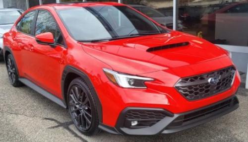 Photo of a 2023 Subaru WRX in Ignition Red (paint color code DCK)