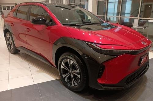 Photo of a 2024 Toyota bZ4X in Supersonic Red (paint color code 2TB)