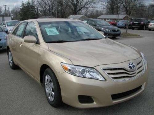 Photo of a 2010-2011 Toyota Camry in Sandy Beach Metallic (paint color code 4T8)