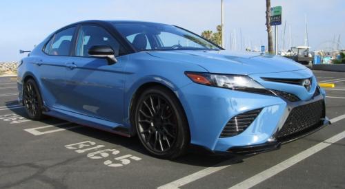 Photo of a 2022 Toyota Camry in Midnight Black on Cavalry Blue (paint color code 2VV)