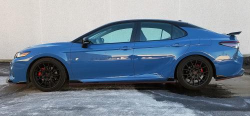 Photo of a 2022 Toyota Camry in Midnight Black on Cavalry Blue (paint color code 2VV)