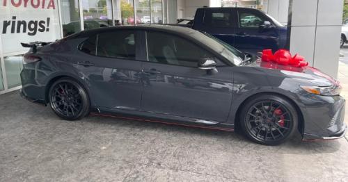 Photo of a 2023-2024 Toyota Camry in Midnight Black on Underground (paint color code 2YE)