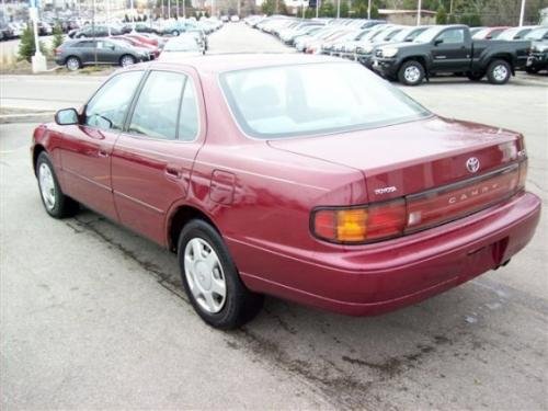 Photo of a 1992 Toyota Camry in Medium Red Pearl (paint color code 3J9
