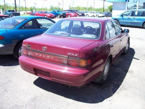 Photo of a 1992 Toyota Camry in Medium Red Pearl (paint color code 3J9
